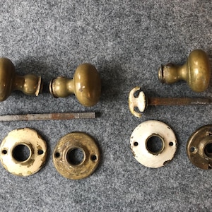 Antique Brass Door Knobs With Spindles & Rosettes - Nine Piece Lot