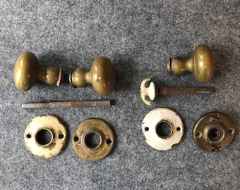 Antique Brass Door Knobs With Spindles & Rosettes - Nine Piece Lot