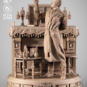 May include: A detailed resin statue of a man in a dressing gown holding a cup, part of a scene with a fireplace, tables, and bottles. The base reads "The Invisible Man". The statue is 1/6 scale.