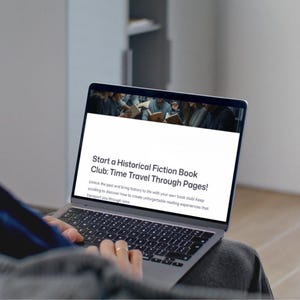 以下が含まれることがあります： 「Start a Historical Fiction Book Club: Time Travel Through Pages!」というテキストが表示されたラップトップ。画面には本を読む人々の姿が映し出されています。ラップトップのキーボードを操作する手が写っています。