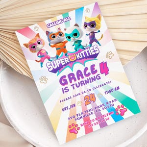 May include: A vibrant birthday invitation with cartoon superhero kittens. The invitation says "Super Kitties" and "Grace is Turning 4." The design includes paw prints and a rainbow background. The date and time of the party are also included.