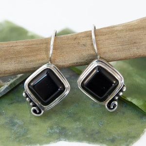 Black Onyx Wicked Stepmother Earrings ~ Black onyx square cabochons in 925 sterling silver ornamental design, swirls and dots, black mirror