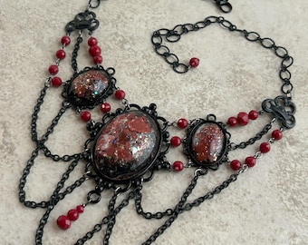 Elaborate Black Metal and Red Festoon Collar