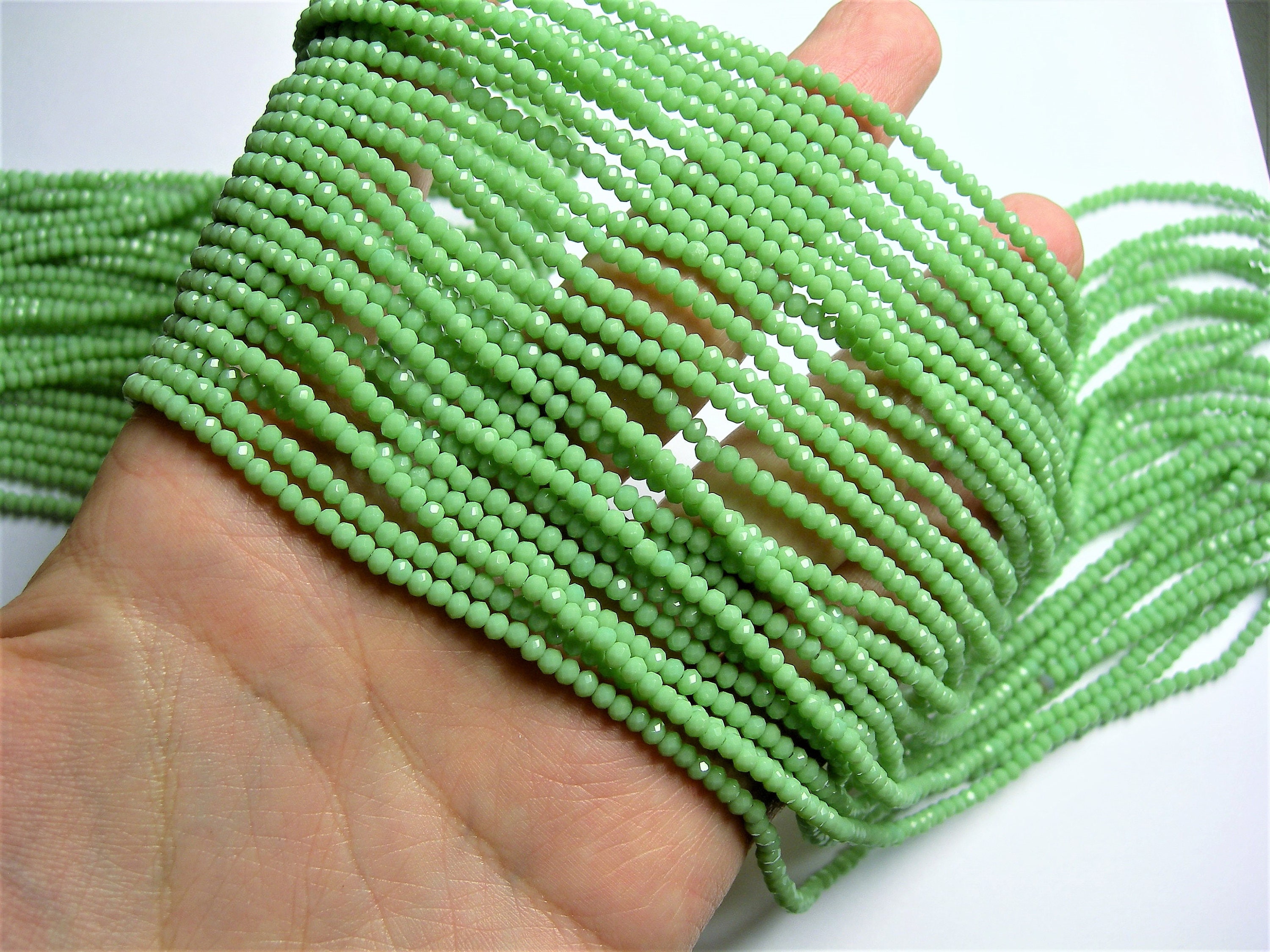 Crystal rondelle faceted 3mm x 2mm beads 196 beads AA quality opaque Green CAA2G175