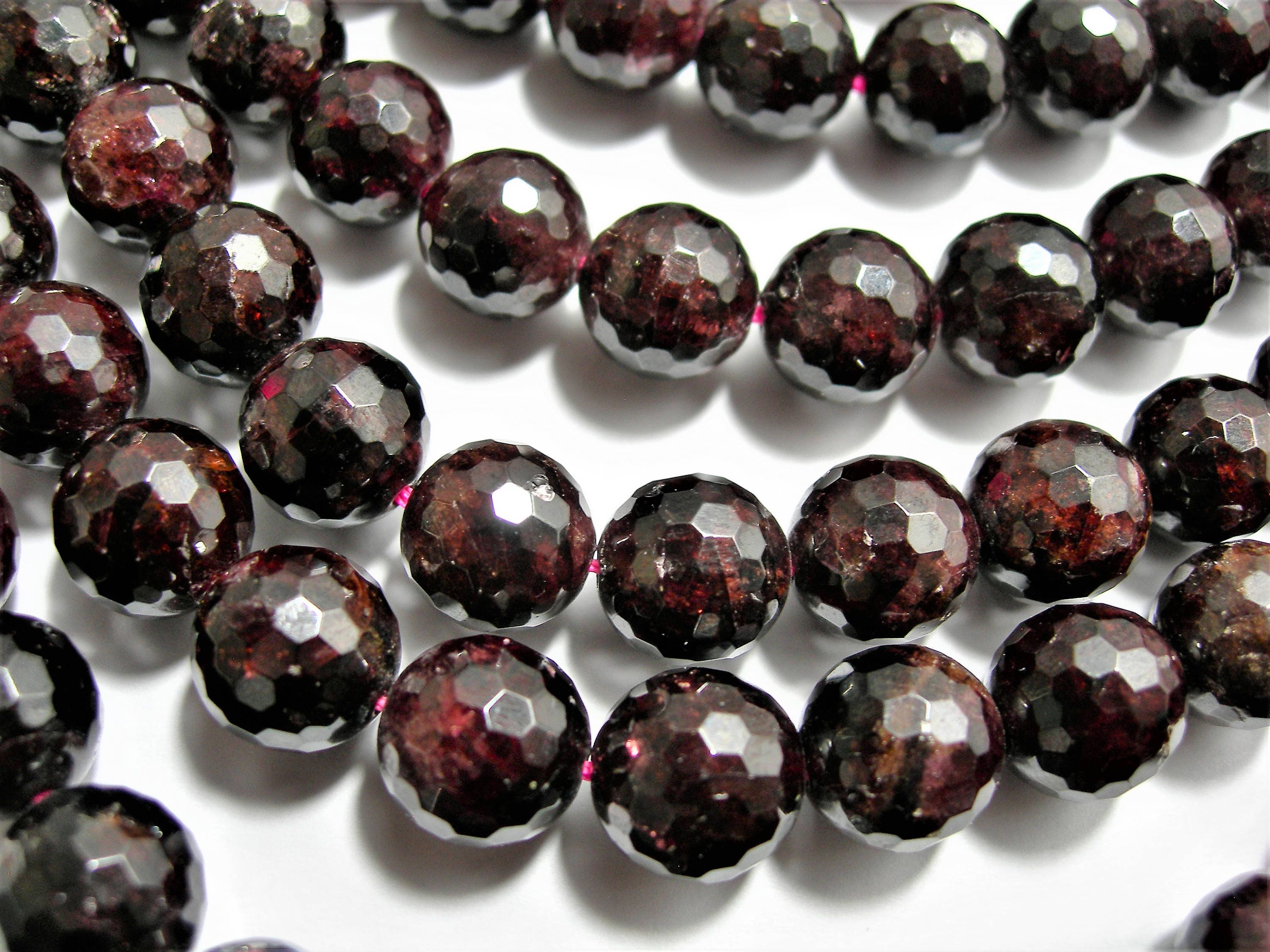 rhodolite garnet faceted rondel sized 2mm 1strand