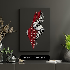 Peut inclure: Impression artistique encadrée représentant une carte stylisée d'une région, intégrant des motifs traditionnels rouges, noirs et blancs. L'œuvre est posée sur un fond gris foncé, avec les mots "TÉLÉCHARGEMENT NUMÉRIQUE" affichés en bas.