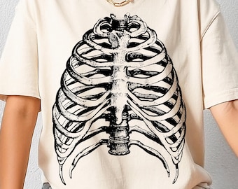 Camiseta retrô com estampa de esqueleto e abóbora: Cores góticas confortáveis