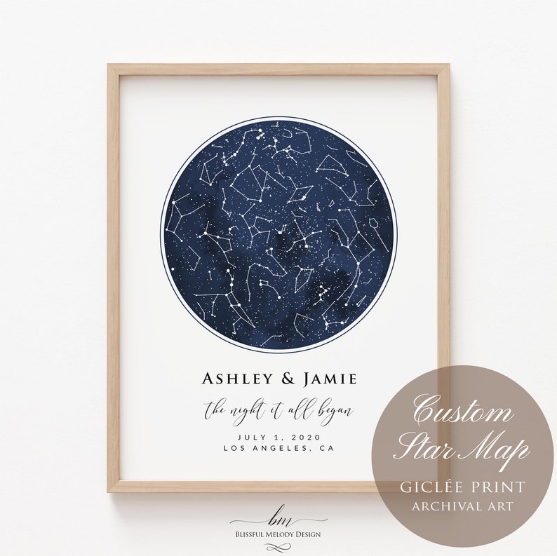 May include: A custom star map print with a navy blue background and white stars. The print features the names Ashley & Jamie and the text "the night it all began" with the date July 1, 2020 and location Los Angeles, CA. The print is labeled "Custom Star Map" and "Gicl&eacute;e Print Archival Art".