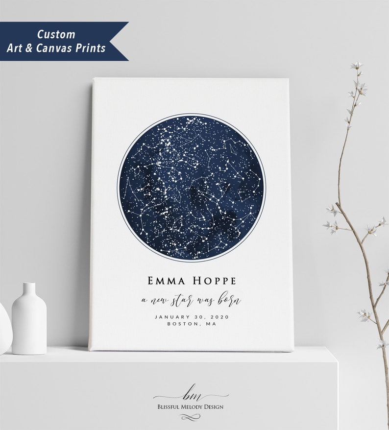 May include: A navy blue and white star map print with the text "EMMA HOPPE a new star was born JANUARY 30, 2020 BOSTON, MA" and the text "bm BLISSFUL MELODY DESIGN".