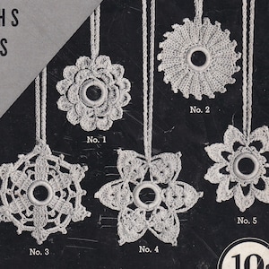 May include: Five crocheted ornaments with different designs, including a snowflake, a star, and a circle. Each ornament has a hole in the center and is hanging from a string. The ornaments are numbered 1 through 5.