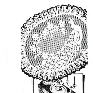 May include: Black and white illustration of three crocheted doilies with a scalloped edge. The doilies are arranged on a table with candlesticks and a vase. The text "Filet Crochet Doilies" is printed below the image.