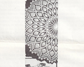May include: A black and white image of a crocheted doily with a scalloped edge. The doily is laid over a table with four chairs. The table is set with a white tablecloth and a vase of flowers.