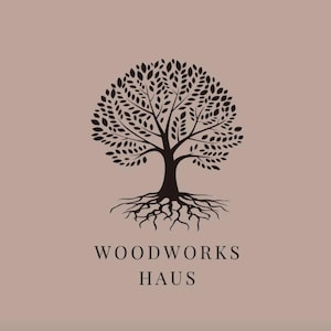 May include: A logo featuring a stylized tree with a full crown of leaves and exposed roots, in a dark brown color. The text "WOODWORKS HAUS" is below the tree on a muted pink background.