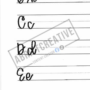 May include: A white practice sheet featuring black cursive letters A through F in both uppercase and lowercase, arranged on horizontal lines. A semi-transparent watermark overlay displays the text ABAD CREATIVE CONTENT CREATOR.