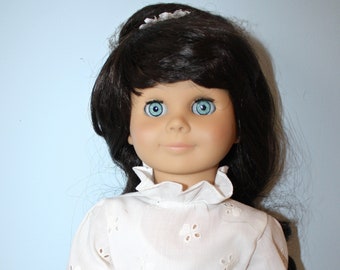 Vintage Doll By RENEE . Rare Hard Plastic Moveable Head Arms Legs . Eyes Close Dark Hair Blue Eyes . Made in West Germany . Collector's Doll