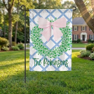 May include: A white ceramic mug with a black handle and the text "But First, Coffee" in a black, bold font. The mug is on a wooden surface.