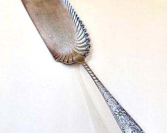 Raspador de migas antiguo de plata chapada, 1847 Rogers Bros, modelo Arcadian, 1884