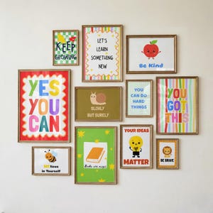 May include: A collection of framed art prints with inspirational quotes and illustrations. The prints feature phrases like "Keep Growing," "Yes You Can," and "Be Kind." The artwork includes images of a bee, an apple, and a lion.