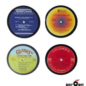 May include: Four vintage vinyl record coasters featuring different artists and album covers. The coasters are black with a white border and feature the album title, artist, and record label. The coasters are a great way to add a touch of vintage style to your home.