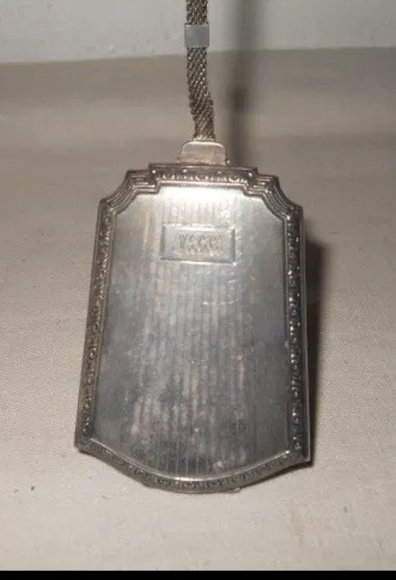 Antique compact wristlet