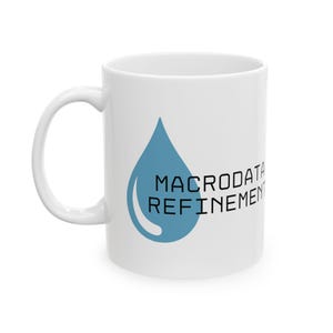 May include: White ceramic mug featuring a blue water drop graphic and the text "Macrodta Refinement" printed on the front.