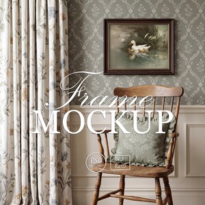 May include: A dark brown wooden picture frame containing a painting of a white duck and ducklings on water, displayed above a wooden spindle chair with a sage green ruffled throw pillow, set against floral wallpaper and patterned curtains.