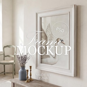 May include: A white framed artwork featuring a swan illustration. The frame is distressed, and the artwork is displayed on a wall. The image includes a vase with lavender, candlesticks, and the text "Frame Mockup" and "Made by Ezra".
