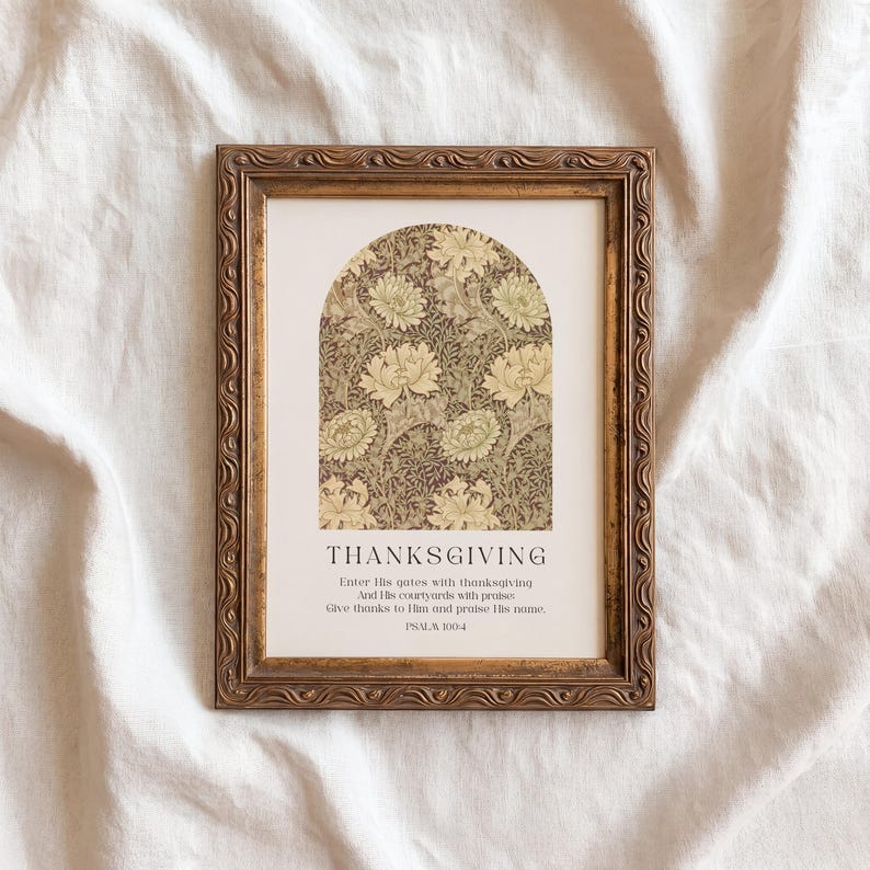 May include: A framed print with the word "THANKSGIVING" and a floral design in a gold frame. The print includes text from Psalm 100:4. The frame has an ornate, vintage style.