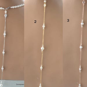 May include: Three back necklaces labeled 1, 2, and 3. Necklace 1 is silver-toned with white pearls and a teardrop crystal. Necklace 2 is gold-toned with pearls. Necklace 3 is rose gold-toned with pearls and a heart-shaped crystal. Text reads DivineJewel.