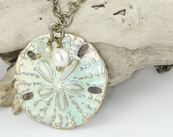 Nautical Jewelry Sand Dollar Summer Jewelry Distressed Rustic Boho Chic Vintage Style Antique Bass Necklace Creamy Sand and Sea Colors