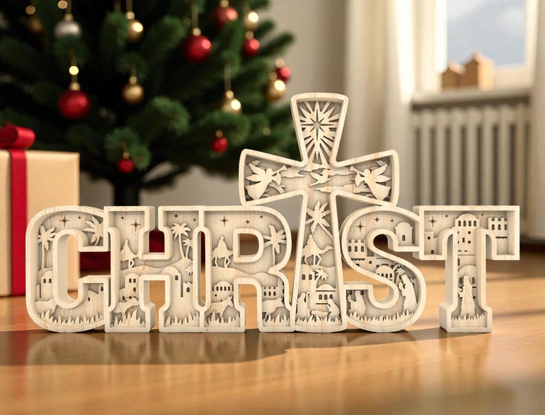 May include: Wooden Christmas decoration spelling out "CHRIST" with a cross design. The letters are intricately carved with scenes of the Nativity. A Christmas tree with red and gold ornaments and a wrapped gift are in the background.