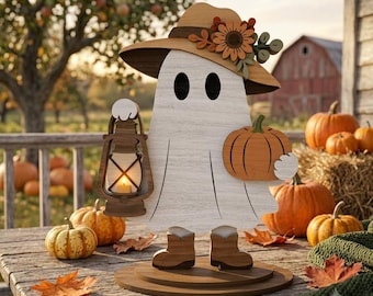 May include: A wooden ghost figurine wearing a tan hat decorated with orange and brown flowers. The ghost holds a brown lantern in one hand and an orange pumpkin in the other, while wearing brown boots and standing on a circular wooden base.