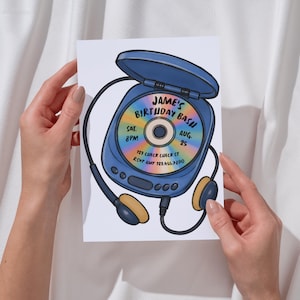 May include: A rectangular invitation card featuring a blue portable CD player illustration with attached headphones. The CD inside displays a rainbow gradient and text reading JAME'S BIRTHDAY BASH, SAT. 8PM, AUG. 25, 123 CHECK CHECK ST, RSVP AMY 123.456.7890.