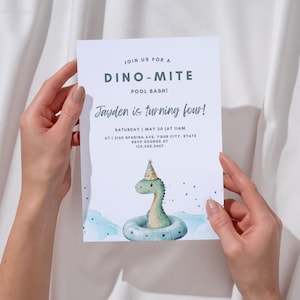 May include: A white invitation card with the text "DINO-MITE POOL BASH!" and "Jayden is turning four!" A cartoon dinosaur wearing a party hat floats in a blue inner tube. The card includes event details: date, time, and RSVP information.