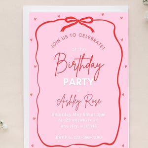 May include: Pink birthday party invitation with a red ribbon and hearts. The invitation reads "Join us to celebrate! at the Birthday Party of Ashley Rose. Saturday May 6th at 3pm. At 123 anywhere st... any city, st 12345. RSVP to 123-456-7890"