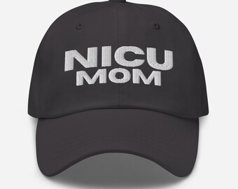May include: A dark grey baseball cap featuring the embroidered words "NICU MOM" in white. The cap has a curved peak and a button on top. This hat is a great gift for a NICU mum.