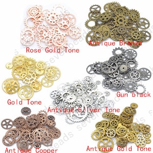 May include: Assortment of metal gears in various finishes, including rose gold, antique bronze, gold, gun black, antique silver, and antique copper.