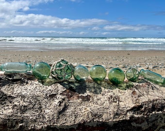 Collection of 8 Japanese Glass Fishing Floats, Shades of Green, Octopus Rollers