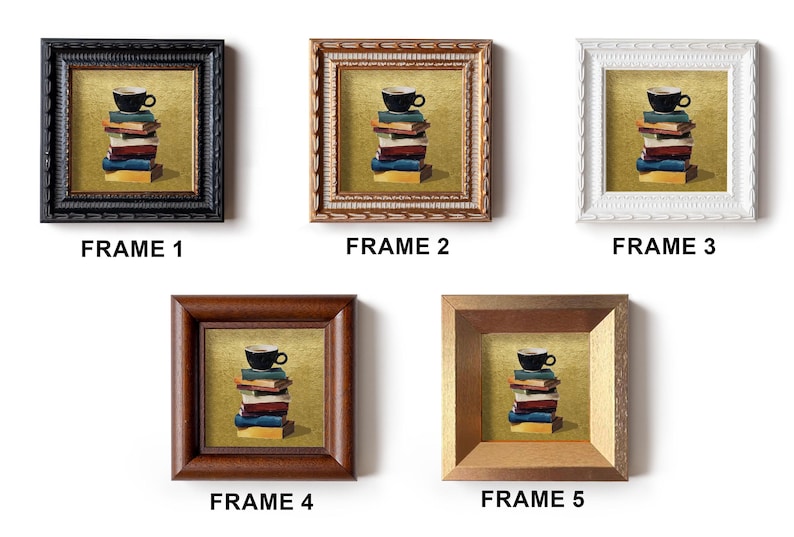 May include: Five framed art prints. Each print features a black coffee cup atop a stack of books. The frames are black, brown, white, and gold. The text "FRAME 1", "FRAME 2", "FRAME 3", "FRAME 4", and "FRAME 5" are below each frame.