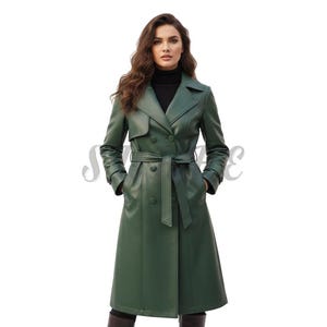 May include: A long, forest green trench coat with a double-breasted design and a matching belt. The coat features a classic lapel collar and button details. The coat is made of a smooth, leather-like material.