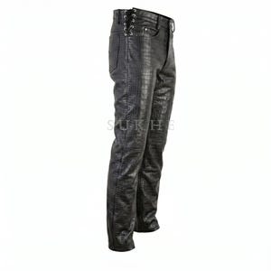 May include: Black leather trousers with a crocodile skin texture. The trousers have a classic five-pocket design, a button and zip closure, and lace-up detailing on the side of the waist. The word "SUKHE" is printed on the trousers.