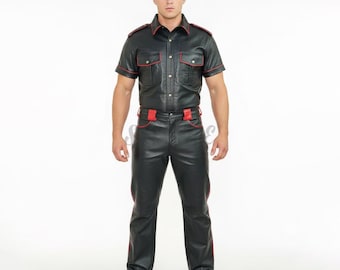 May include: Black leather shirt with red trim and two chest pockets. Matching black leather pants with red trim. The shirt has short sleeves and a button-down front. The pants have a straight leg design.