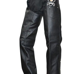 May include: Black leather motorcycle chaps with a belt and buckle closure. The chaps have a classic design with a pocket on the right leg and decorative stitching. A tag that says "Genuine Leather" is attached.