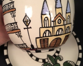 New Orleans architecture inspired cup and saucer with green fleur de lis