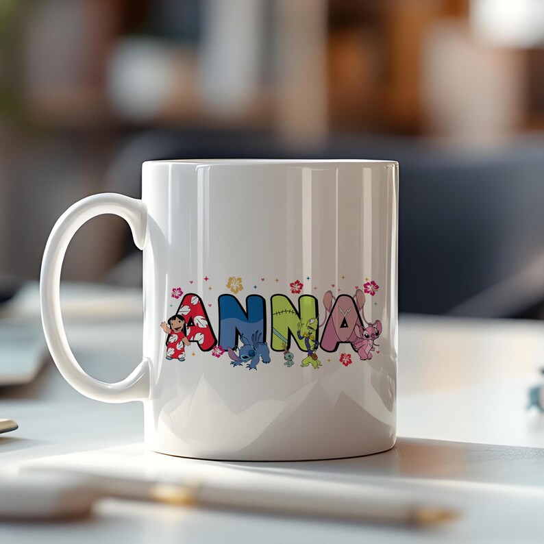 May include: White ceramic mug with the name "ANNA" printed in colorful letters. Each letter features a different character from the animated movie Lilo & Stitch, with floral accents.