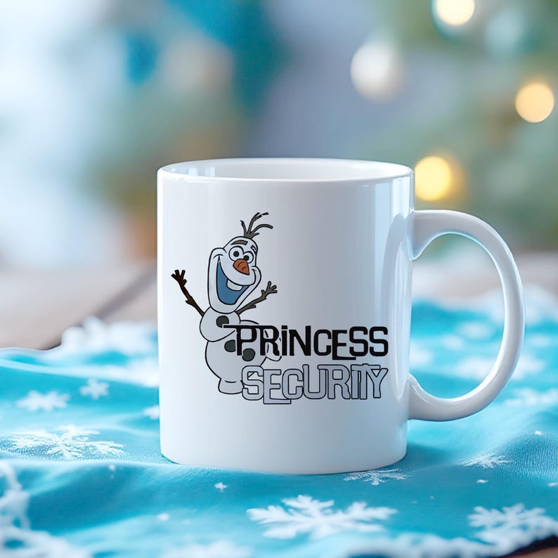 May include: White ceramic mug featuring a cartoon Olaf snowman character with the text "PRINCESS SECURITY" in black and gray. The mug has a curved handle and is set on a blue snowflake-patterned cloth.