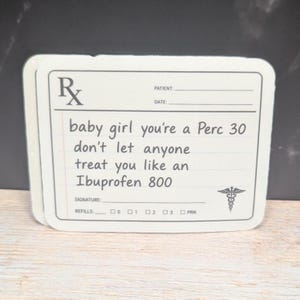 May include: A stack of white prescription-style stickers with rounded corners. The text reads "baby girl you're a Perc 30 don't let anyone treat you like an Ibuprofen 800." Includes a medical symbol.