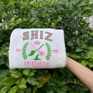 Embroidery Shiz University Wicked Glitter Sweatshirt, Elphaba and Glinda Hoodie, Wicked Defy Gravity, Emerald City Oz Gifts ESH2516.2H