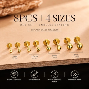 Peut inclure: Un ensemble de 8 boucles d'oreilles à tige avec embout sphérique doré en titane de qualité implantable. Le lot comprend 4 tailles : 2mm, 2,5mm, 3mm et 4mm, avec 2 pièces par taille. Le texte indique 8PCS | 4 SIZES, ONE SET | ENDLESS STYLING.