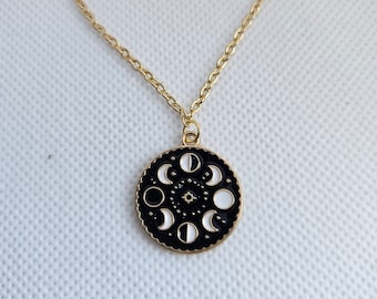 Moon Magic-gold enamel charm necklace.